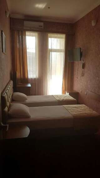 Гостиница Корсар Адлер Стандартный двухместный номер с 1 кроватью или 2 отдельными кроватями-6